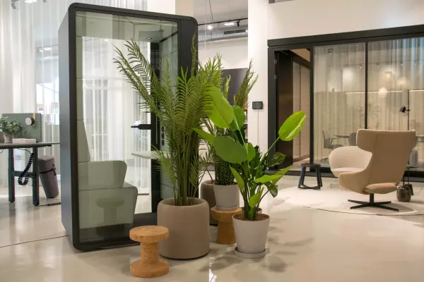 Office with Framery phonebooth with plants around, and comfortable seats