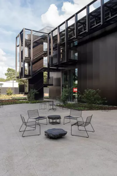 Outdoor area with black patio chairs